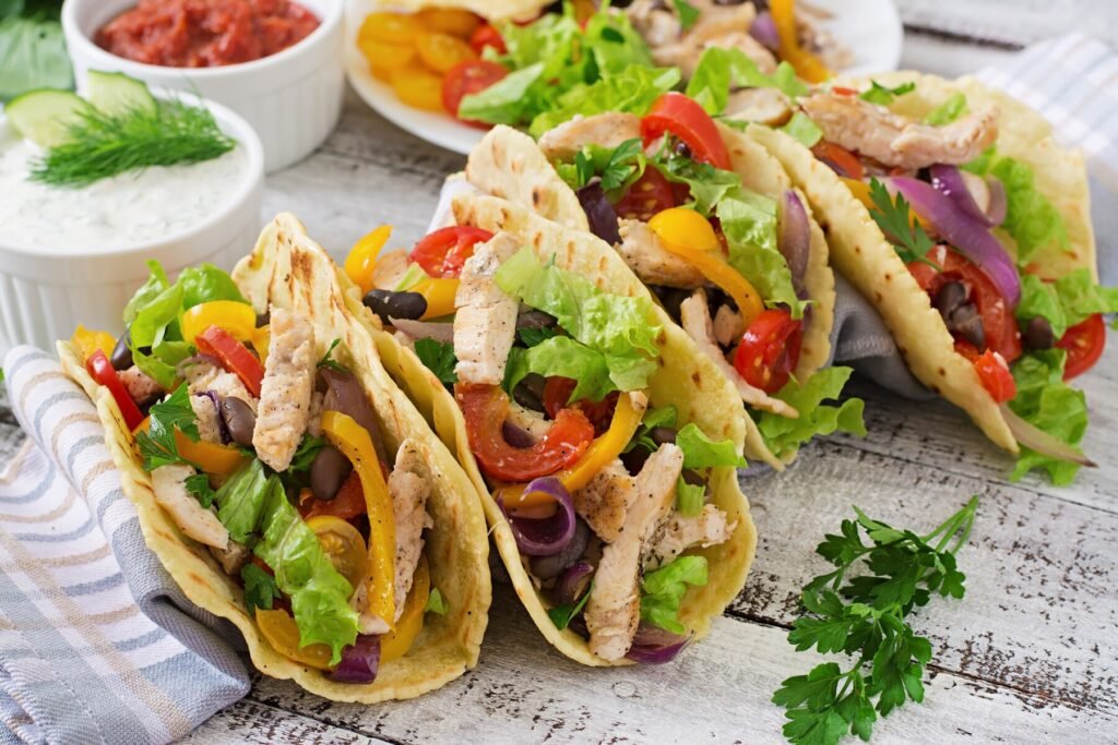 a group of tacos on a table