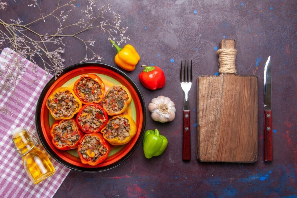 a plate of stuffed peppers and vegetables