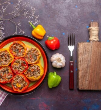 a plate of stuffed peppers and vegetables